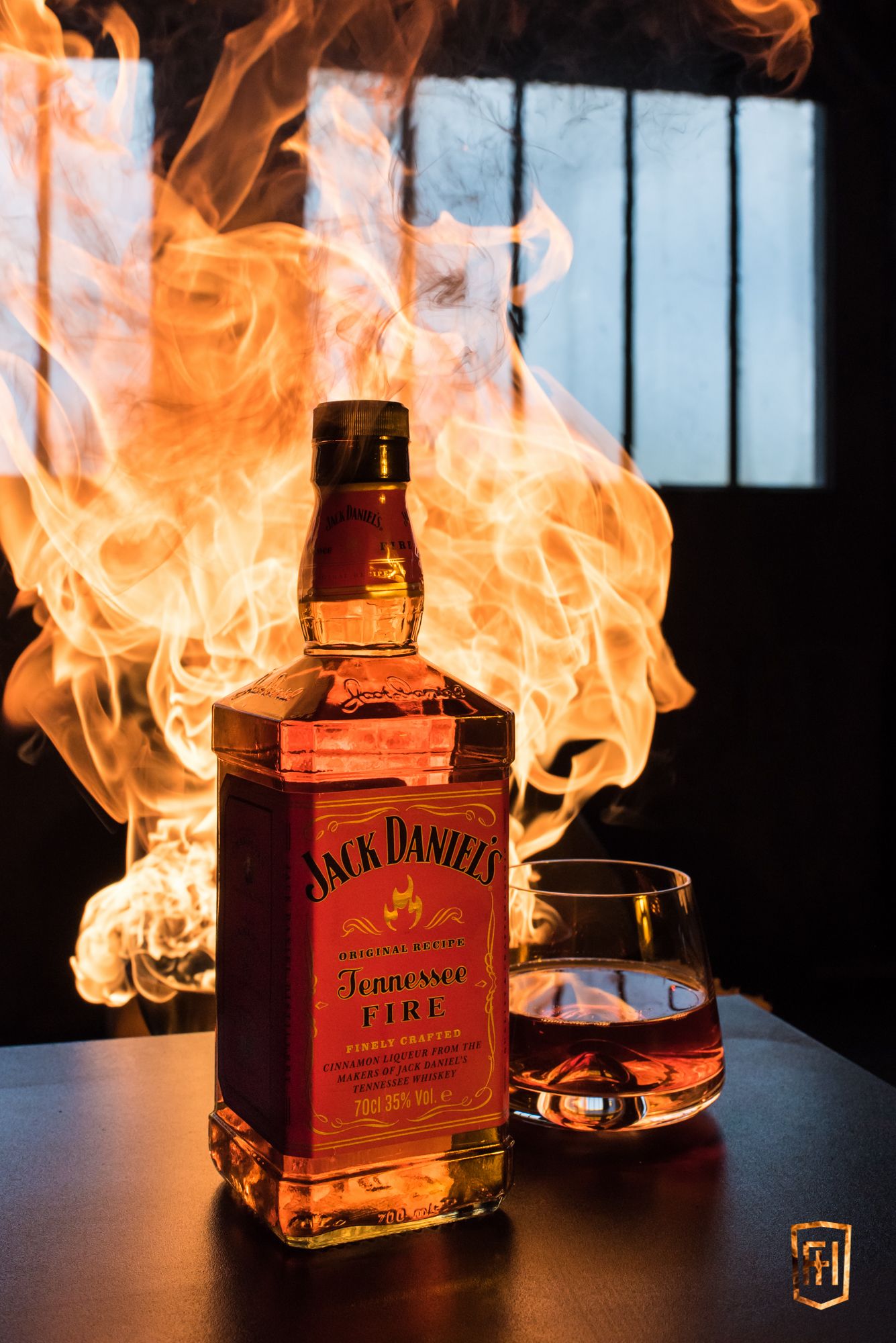 Packshot: Jack Daniel’s Tennessee Fire and a Normann Copenhagen glass, in flames