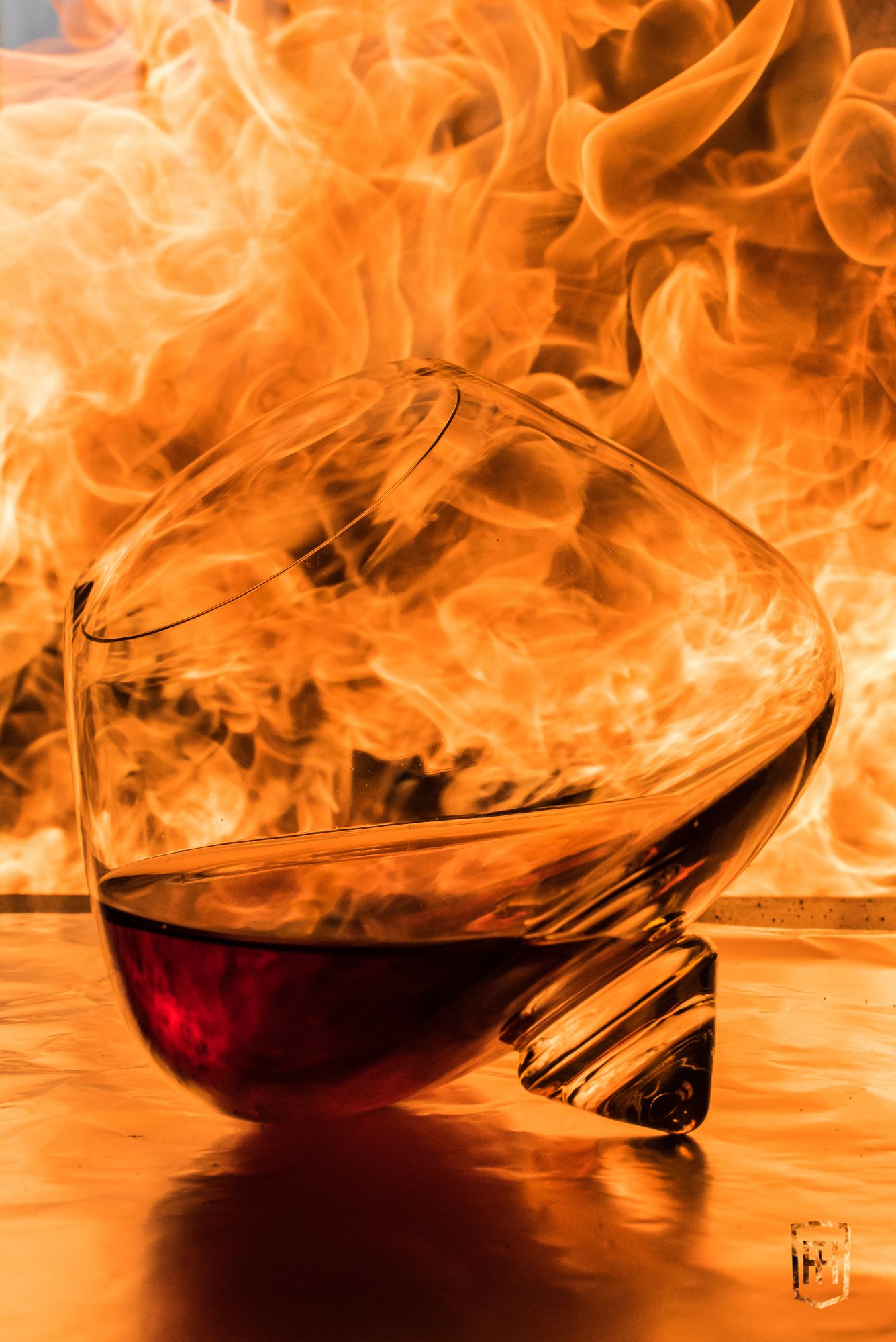 Packshot of a Normann Copenhagen glass in flames
