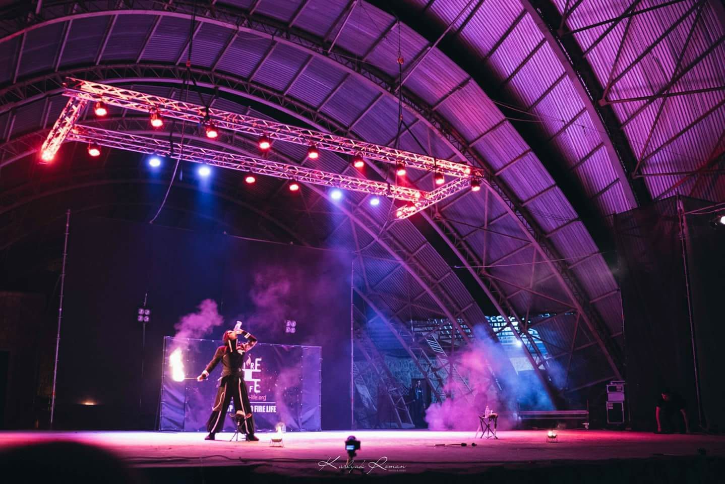 The Fire Life Fest 2018 stage under purple lights