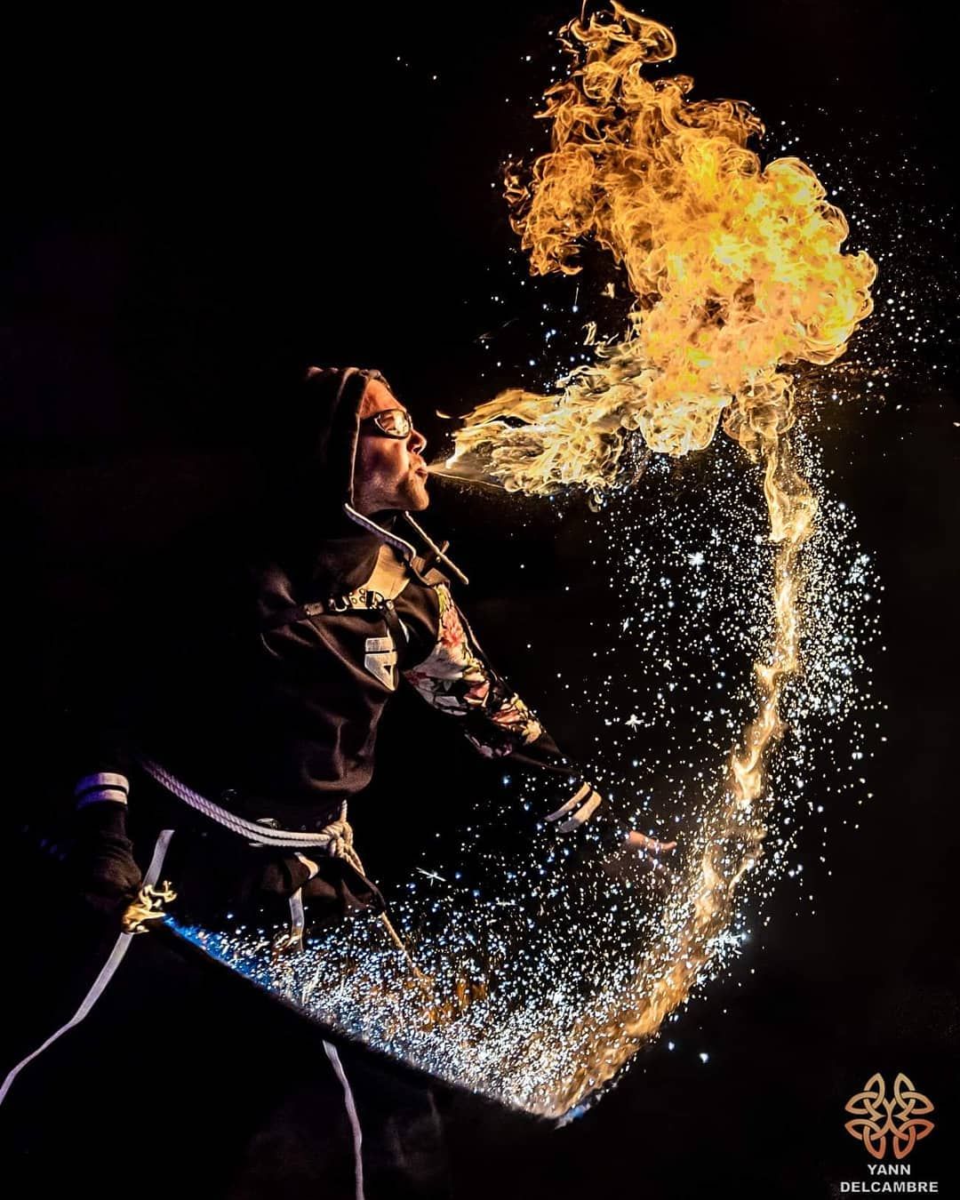 Graülich 2018: a flame and an arc of sparks from the katana